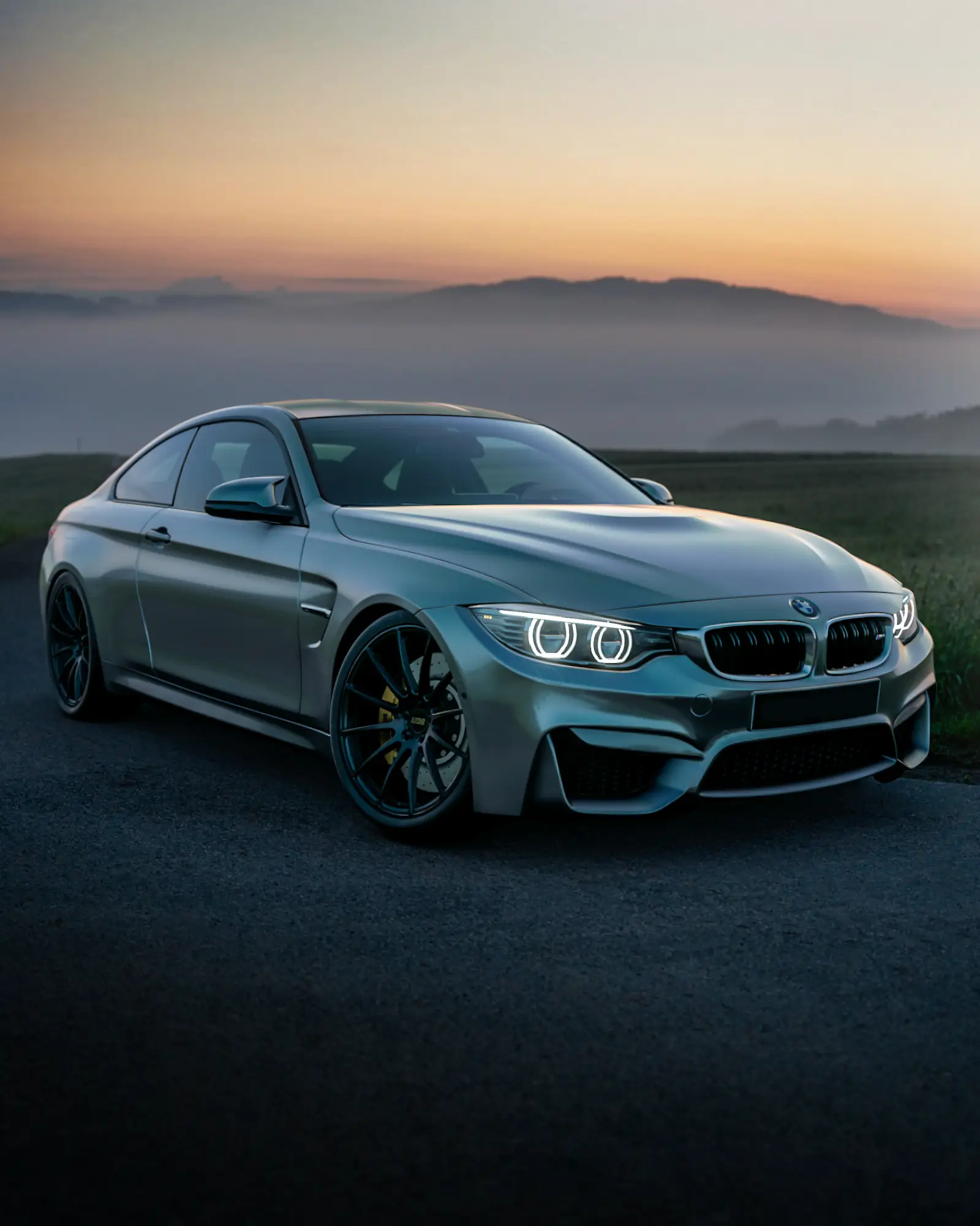 Grey BMW M4 coupe after a suspension refresh