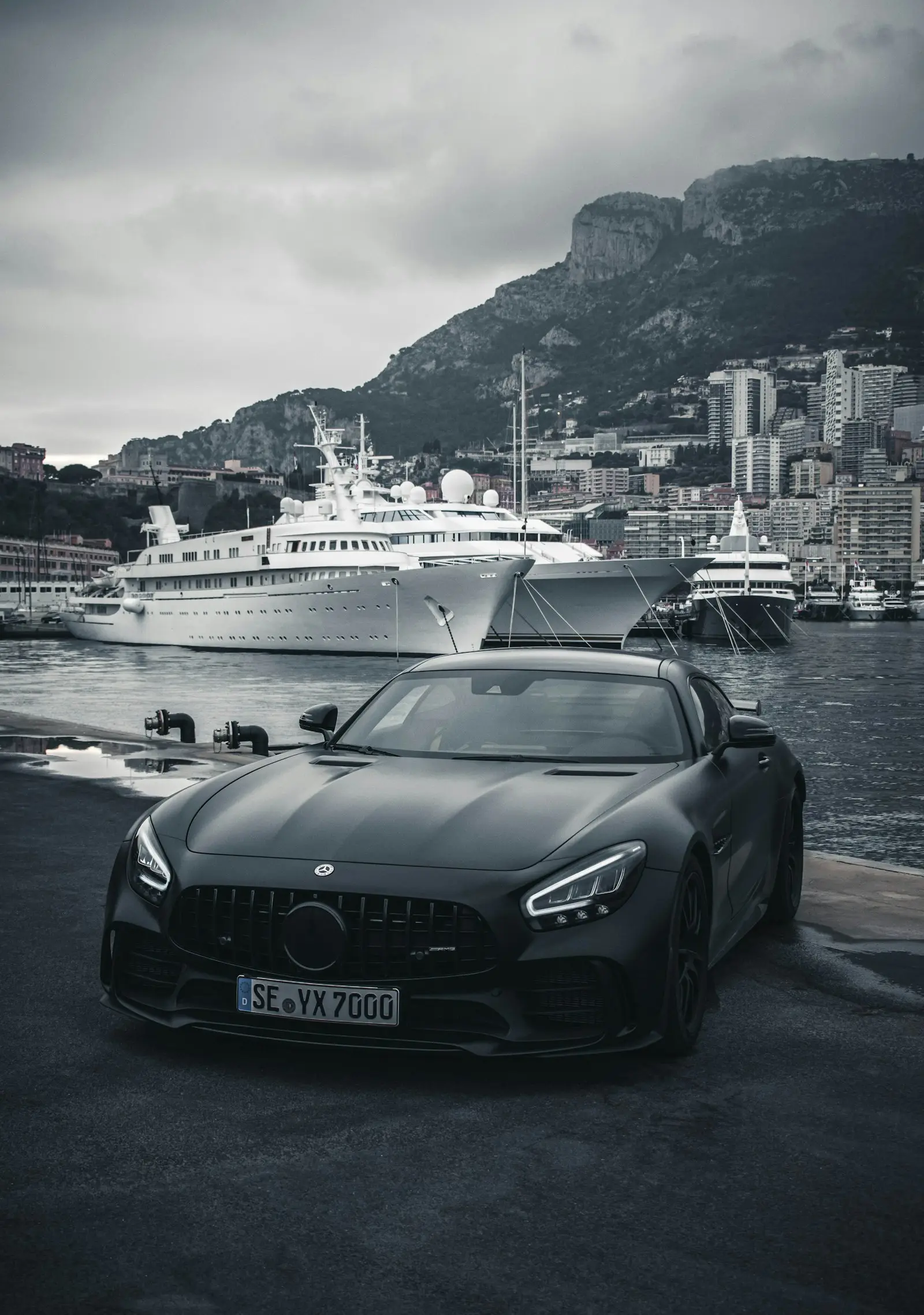 Matte black Mercedes AMG GT on the waterfront